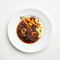 Braised beef cheeks - cheesy polenta - orange marmalade gremolata