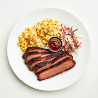 Sticky braised beef brisket with charred pearl onions