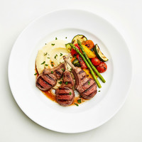 Grilled Lamb Cutlets with Chips and Salad