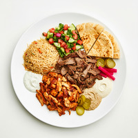 Beef shawarma, pickled chilli, sumac onions, iskender sauce, haloumi, toum, tomato